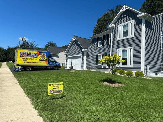 House on street with Fixed Right & Guaranteed sign in the front yard.