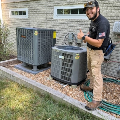 Fixed Right Technician With Hvac Unit Thumbs Up